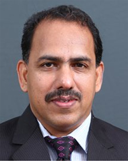 Dr. Ummer K