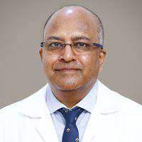 Dr Murugan N