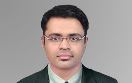 Dr Junise M